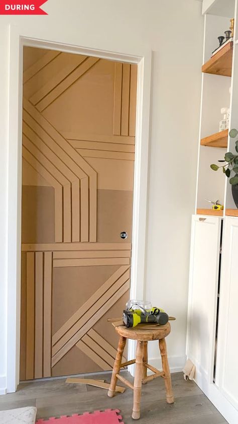 During: door being decorated with hardboard Door Redo, Diy Interior Doors, Deur Sticker, Barn Door Designs, Modern Barn Door, Halloween Door Decorations, Diy Barn Door, White Doors, Modern Barn