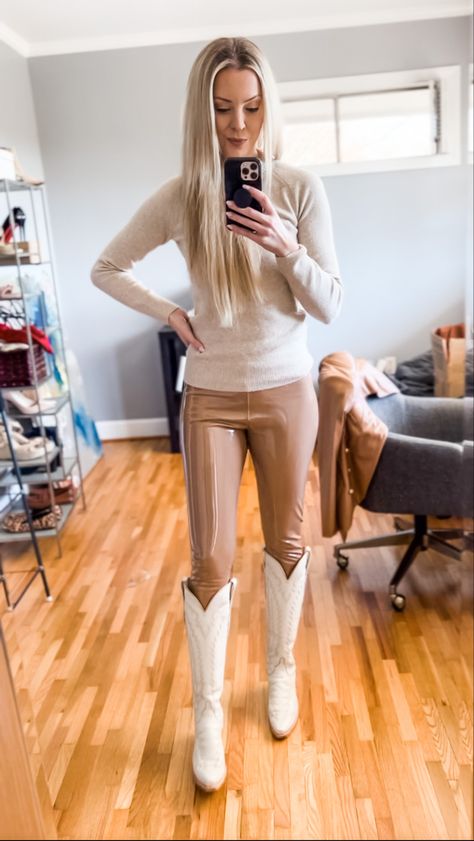 Tan patent leather leggings paired with cream cowboy boots — the perfect nuetral outfit thatll take you from fall to spring. Tan Leather Leggings Outfit, Tan Leather Leggings, Patent Leather Outfits, Cream Cowboy Boots, Patent Leather Leggings, Leather Leggings Outfit, Boot Pulls, Leggings Outfit, Tall Riding Boots