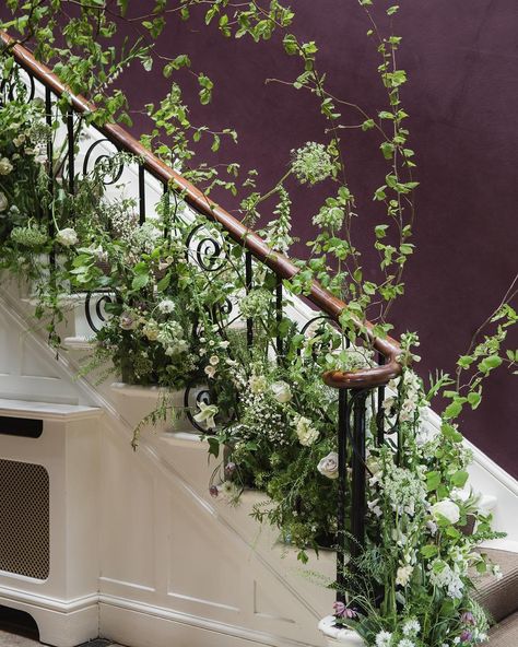 Jen Evans on Instagram: “Winter • Looking back over the most beautiful year. The floral staircase created by the ladies on the @tallulahroseflowerschool floral…” Flowers Stairs, Staircase Florals Wedding, Stairs Floral Decor Wedding, Staircase Flowers Wedding Banisters, Staircase Floral Installation, Wedding Stairs, Wedding Staircase, White Roses Wedding, Corporate Flowers