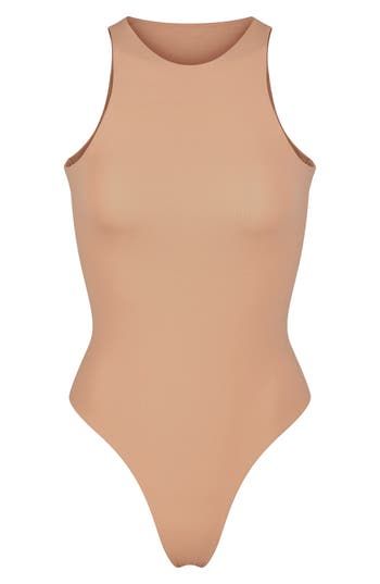 Sculpt your body's natural shape with a high-neck bodysuit from Kim Kardashian West's SKIMS that holds you in and lifts you up in all the right places. Reflecting the brand's passion for highly technical shapewear solutions for every body, this everyday piece has whisper-soft, seamless construction, high-cut legs and a thong back that remains invisible under clothing. Snaps between legs Crewneck Sleeveless Lined 76% polyamide, 24% elastane Machine wash, tumble dry Imported Women's Clothing Lantern Sleeve Sweater, High Neck Bodysuit, Black Brick, Corset Mini Dress, Beautiful Figure, Yoga Set, Long Sleeve Sweater Dress, Ribbed Knit Sweater, Corset Style