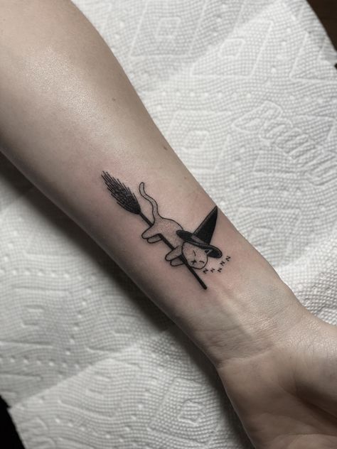 Witch Cat Tattoo Ideas, Cat In Witch Hat Tattoo, Cat Broom Tattoo, Friday The 13th Cat Tattoo, Mini Witch Tattoo, Women Back Of Leg Tattoo, Witchy Minimalist Tattoo, Cat Mushroom Tattoo, Wizard Cat Tattoo