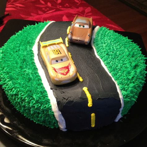 Birthday Cake with Road and Toy Cars Homemade Cars Cake, Disney Cars Cake Diy, Car Shaped Cakes For Men, Disney Cars Sheet Cake, Cake With Road And Cars, Car Cakes For Boys, Lightning Mcqueen Birthday Cake, Mcqueen Cake, Race Car Cakes