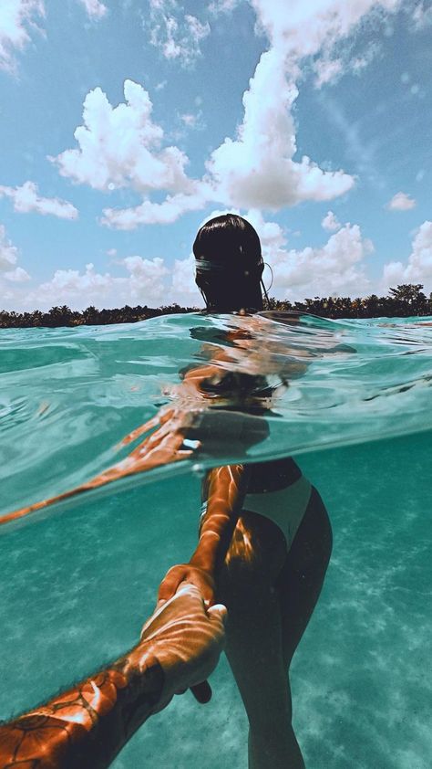 A girl with dark hair leads the photographer into the waters of Cocalitos Cenote in Bacalar, Quintana Roo, Mexico. Tropical trees line the horizon and the sky is blue. She wears a white bikini. Couple In Mexico Aesthetic, Couples In Mexico, Cute Mexico Pictures, Cancun Mexico Picture Ideas, Mexico Vacation Pictures, Mexico Baecation, Mexico Vacation Aesthetic, Cancun Mexico Pictures, Cancun Aesthetic