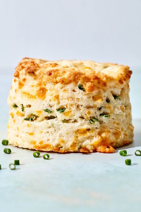 Learn how to make THE BEST cheddar chive biscuits—crispy outside, tender inside, and loaded with cheesy goodness and fresh garden chives. Cheddar And Chive Biscuits, Litha Recipes, Pork Tenderloin Side Dishes, Cheddar Chive Scones, Pork Tenderloin Sides, Chive Bread, Cheddar Chive Biscuits, Molasses Baked Beans, Chive Biscuits