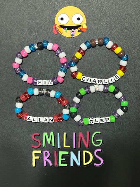 Bracelets based off of the Smiling Friends! Each bracelet is made out of 27-28 plastic pony beads, and a stretchy string so these bracelets can fit anyone! Smiling Friends Bracelet, Best Friend Braclet Ideas, Smiling Friends Perler Bead, Candy Bracelet Ideas, Funny Kandi Bracelets, Pony Bead Bracelets Ideas, Matching Kandi Bracelets, Scene Bracelets, Scene Kandi