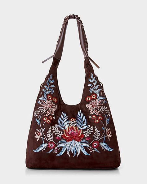 How pretty is the floral embroidery on our Stevie Bag? Its boho through and through.