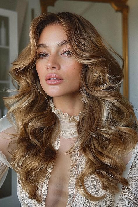 The Cutest Long Layered Haircuts of 2024 Curled Layered Hair Long, Bouncy Blow Dry Curls, Big Romantic Curls, Blowout With Loose Curls, Curls With Layered Hair, Bouncy Blowout Wedding Hair, Big Curly Blowout, Voluminous Curled Hair, Voluminous Blowout Medium Hair