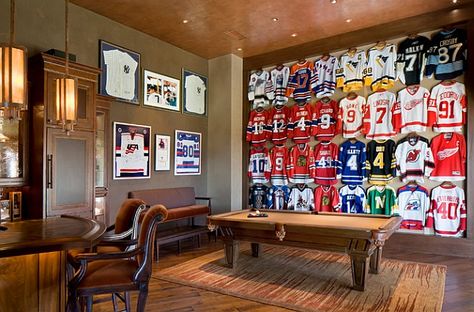 Framed Jerseys: From Sports-Themed Teen Bedrooms To Sophisticated Man Caves! Man Cave Ideas Sports, Man Cave Paintings, Hockey Man Cave, Man Cave Designs, Best Man Caves, Rustic Man Cave, Sports Man Cave, Man Cave Lighting, Man Cave Ideas