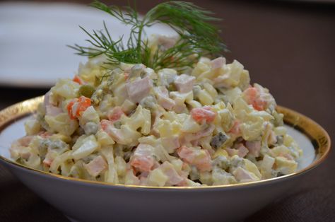 This salad is very famous in Russian/Ukrainian culture. It’s a must on the New Year table.As always there is different variations of this salad,every family has their own recipe.It consist of diced potatoes,carrots,eggs, bologna, pickles and peas that’s usually combined with mayonnaise. You can also substitute bologna for cooked chicken meat or beef,fresh cucumbers instead … Salad With Peas, Russian Salad Recipe, Russian Potato Salad, Potato Salad Dill, Potato Salad With Egg, Easy Potato Salad, Salad Recipes Video, European Cuisine, Salad Sandwich