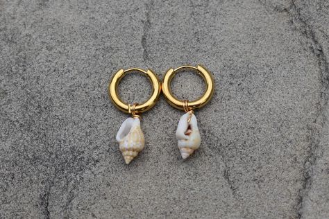 These earrings are handmade. they are very secure to your ear once clasped, and feature natural mini shells! since the shells are real and natural, every pair of earrings will be unique and one of kind. please message us with any questions about this item! Jewelry Nails, Shell Hoop Earrings, Cowrie Shell Jewelry, Gold Huggies, Cone Shell, Seashell Jewelry, Birthday Idea, Jewelry Making Tools, Diy Closet