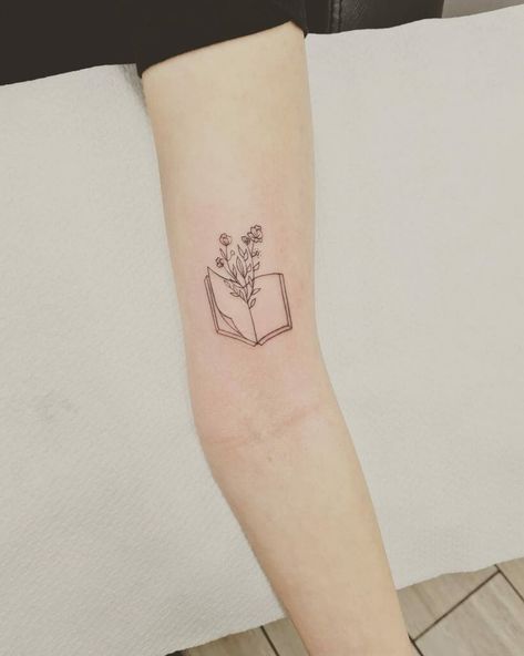 Book Tattoo Inspired By Minimal Line-drawing Minimalist Book Tattoo, Open Book Tattoo, Tattoo Design Minimalist, Book Inspired Tattoos, Reading Tattoo, Minimal Book, Bookish Tattoos, Minimalist Book, Literary Tattoos