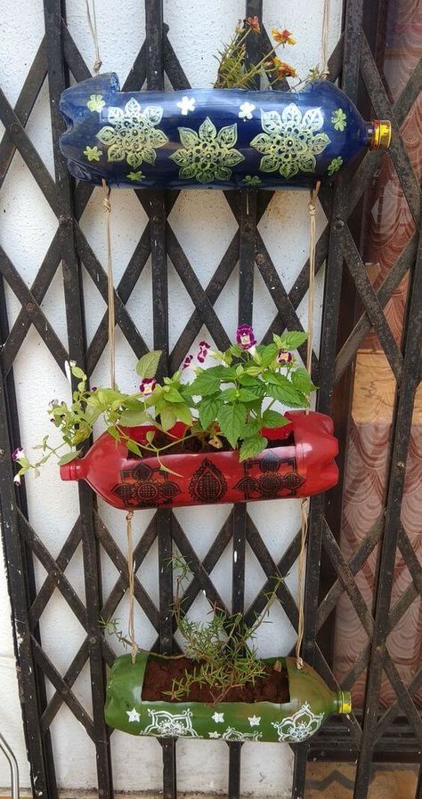 Planter Plastic Bottle, Recycle Bottle Planters, Plastic Bottle Garden Art, Diy Hanging Bottle Planter, Diy Flowers From Plastic Bottles, Recycle Plant Pots, Diy Plastic Bottles Ideas Recycling, Plastic Bottle Hanging Planter, Upcycled Plastic Bottles