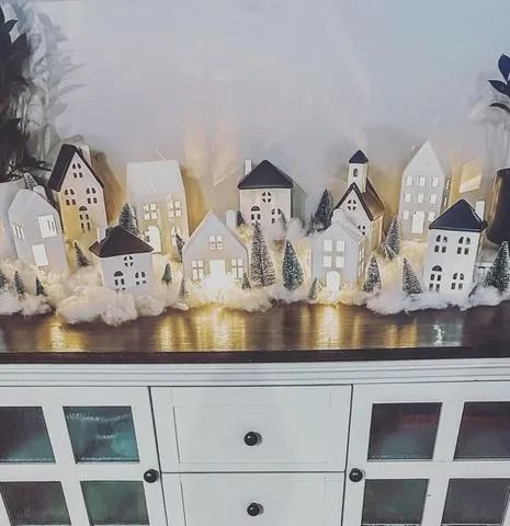 20 Christmas Village Display Ideas To Fill Your Home With Nostalgic Holiday Spirit Christmas Town Display, Decorating Bathroom Ideas, Minimalist Home Decorating, Christmas Village Ideas, Holiday Village Display, Christmas Village Display Ideas, Village Display Ideas, Diy Christmas Village Displays, Christmas Tree Village Display