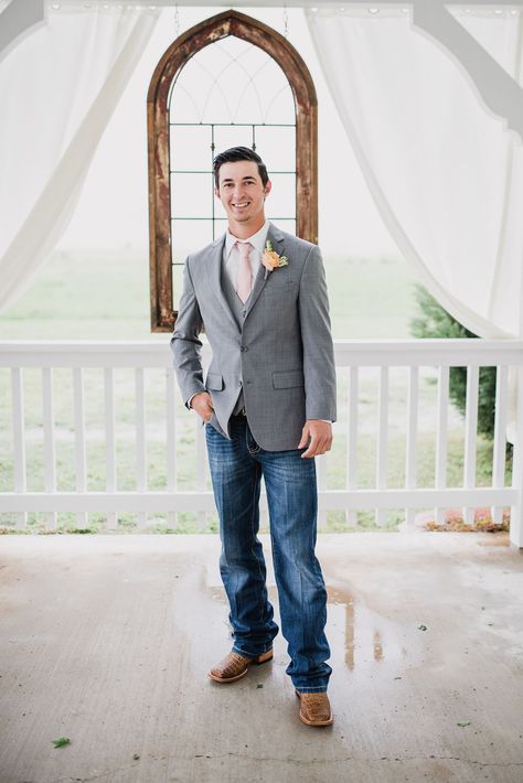 Groom wearing suit jacket and jeans with cowboy boots. Groom in gray suit jacket with boots.  Photo by: Rebecca Chesney Photo & Film Grey Jacket And Jeans Groom, Suit Jackets And Jeans Wedding, Tux With Jeans And Boots, Jeans And Sports Coat Wedding, Country Groomsmen Attire Jeans, Suit And Jeans For Men Wedding, Gray Suit Jacket With Jeans Wedding, Groom Outfit With Jeans, Jeans And Jacket Wedding Guys