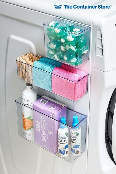 Designed to attach to your washer or dryer, these magnetic bins turn unused space into convenient storage. Organize laundry supplies and eliminate clutter. Everything remains easy to find, thanks to clear plastic construction. To keep the look clean, the white back panel conceals magnets. Dryer Lint Container, Organize Laundry, Utility Room Ideas, Look Clean, House Needs, The Container Store, Laundry Supplies, Utility Rooms, Container Store