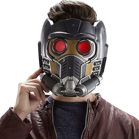 The Marvel Legends Star Lord Helmet, a must-have for any Marvel fan! This officially licensed helmet captures the essence of Star Lord’s iconic helmet from the Guardians of the Galaxy series. With its intricate design and premium quality, this helmet is perfect for cosplay or display. It features electronic sound effects, LED lights, and an... Marvel Legends Star Lord Helmet on Cool Stuff To Buy - Cool Things, Cool Gadgets & Unique Gifts! Star Lord Helmet, Starlord Mask, Warrior Fashion, Cool Stuff To Buy, Iron Man Helmet, Stuff To Buy, Marvel Legends Series, Classic Video Games, Replica Prop