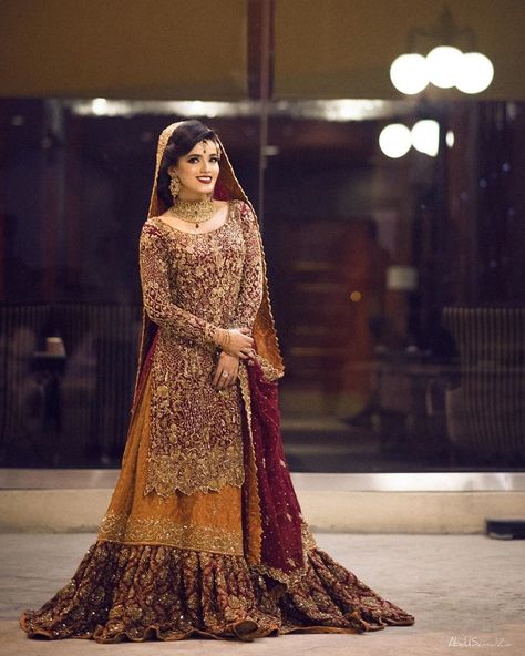 Looking for more such Sharara suits ? Head to out blog, Click on the link attached below for more such wedding fashion inspiration, ideas and trends.  #indianweddings #shaadisaga #intimateweddings #bridalfashion #sharara #shararasuit #pakistanisuit #pakistaniwear #trendyshararasuit Rust Bridal Lehenga, Barat Dress Ideas, Wedding Lehngas, Sharara Design, Wedding Dresses Pakistan, Barat Dress, Maroon Lehenga, Asian Bridal Wear, Mehendi Function