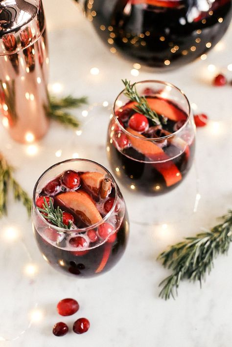 Christmas Sangria: Holiday Sangria Recipe - Lulus.com Fashion Blog Easy Mulled Wine, Holiday Sangria Recipes, Christmas Sangria Recipes, Holiday Sangria, Christmas Party Drinks, Christmas Sangria, Cocktail Fruit, Mulled Wine Recipe, Wine Recipe