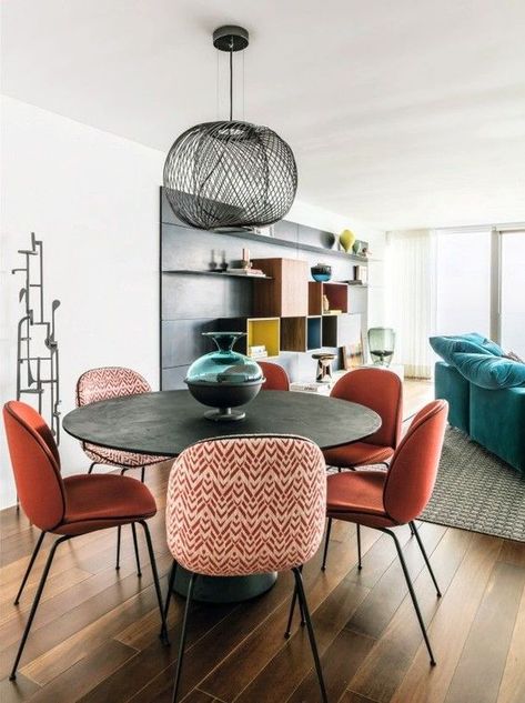 Gemini astrology home decor guide | Bohemian dining room table orange chairs | Girlfriend is Better Bohemian Dining Room Table, Coral Home Decor, Orange Chairs, Bohemian Dining Room, Dinner Room, Dining Room Inspiration, Decor Guide, Interior Deco, Dining Room Design