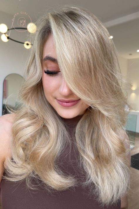 Voluminous bouncy blowout with a deep side part. Side Part Blowout, Blowout Hair Curls, Blonde Side Part, Bouncy Blowdry, Bouncy Blowout, Deep Side Part, Creamy Blonde, Blowout Hair, Side Bangs