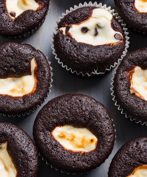 These Black-bottom cupcakes are best known—and loved—for their creamy cheesecake centers. No frosting needed! Black Bottom Cupcakes, Donut Toppings, Caramel Chocolate Bar, Healthy Cupcakes, Known And Loved, Cookie Toppings, America's Test Kitchen Recipes, America's Test Kitchen, Black Bottom