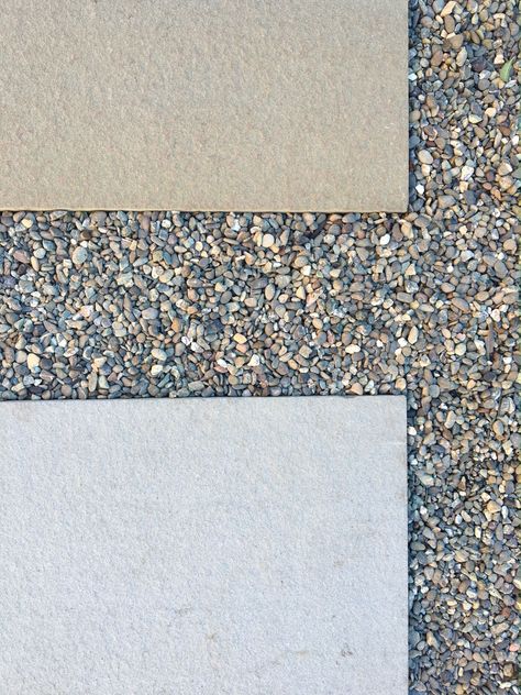 Pea gravel filler is used as a permeable “grout” between oversize concrete patio pavers. For more, see Hardscaping 101: Pea Gravel. Heated Sofa, Diy Patio Pavers, Garden Pavers, Building A Patio, Concrete Patios, Patio Pavers Design, Patio Pavers, Paver Walkway, Patio Projects