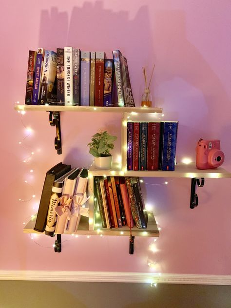 On Wall Book Shelves, Led Lights Bedroom Shelves, Decorated Walls In Bedroom, Led Lights On Floating Shelves, Bookshelf Wall Aesthetic, Cute Book Display Bedroom, Floating Book Shelves Aesthetic, Floating Shelf With Books, Hanging Wall Bookshelves