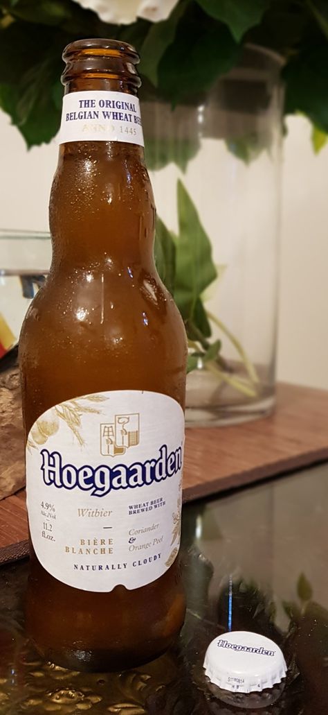 Hoegaarden the original Belgian Spicy Wheat Beer, with Coriander & Orange peel. Naturally Cloudy. Hoegaarden Beer, Wheat Beer, Orange Aesthetic, Brown Aesthetic, Orange Peel, Beer Bottle, Wheat, Aesthetic Pictures, Beer