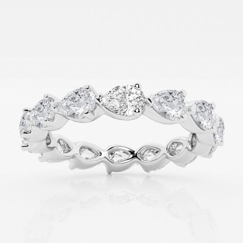 Elegantly set in an east-west pattern, these pear shaped lab grown diamonds sparkle flirtatiously on this eternity band. Made for those who love to merge fashion and elegance in everything they wear. Expensive Diamond, Fake Diamond, Diamond Eternity Ring, Yellow Engagement Rings, Diamond Eternity Band, Yellow Gold Engagement, Yellow Gold Engagement Rings, Eternity Ring Diamond, White Gold Engagement