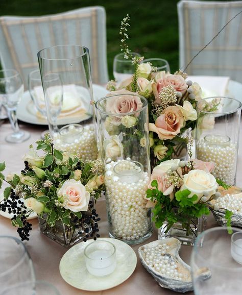 Glass cylinders filled with pearls surrounding glass votive holder and candle. Vintage Wedding Centerpieces, Pearl Centerpiece, Vintage Wedding Table, Flowers Candles, 30th Wedding Anniversary, Unique Wedding Flowers, Wedding Centerpieces Diy, Vintage Wedding Decorations, Wedding Table Decorations