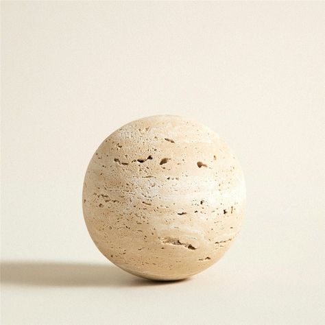 "'Sahi' Travertine Sphere Decorative sphere is crafted using natural stone travertine by human hands in 4 inches. Every HAAND piece is hand-made by our expert stonemasons. All stone has variations, much like a fingerprint, each piece is uniquely its own. Perfect as a shelf decor, stylish on table top. It can be paired with other pieces of our travertine collection.   SPECIFICATION Dimensions: 4\"Ø  Finish: Honed Cream Beige Travertine Travertine is a form of terrestrial limestone deposited around mineral springs, especially hot springs. Travertine often has a fibrous or concentric appearance and exists in white, tan, cream-colored, and even rusty varieties. It is formed by a process of rapid precipitation of calcium carbonate, often at the mouth of a hot spring or in a limestone cave. In t Beige Objects, Travertine Decor, Sphere Table, Travertine Colors, Limestone Caves, Marble End Tables, Cream Stone, How To Tie Ribbon, Beige Stone