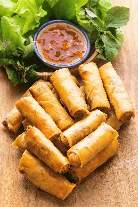 These homemade Cha Gio Chay are wrapped using ingredients like taro and cabbage for a nutty and sweet filling that you won't find in stores! #vegetarianspringrolls #vietnamesespringrolls #chagio Vegetarian Fish Sauce, Taro Recipes, Vegetarian Spring Rolls, Vietnamese Grilled Pork, Pork Skewers, Vietnamese Spring Rolls, Spring Roll Recipe, Vegetarian Cabbage, Spring Roll