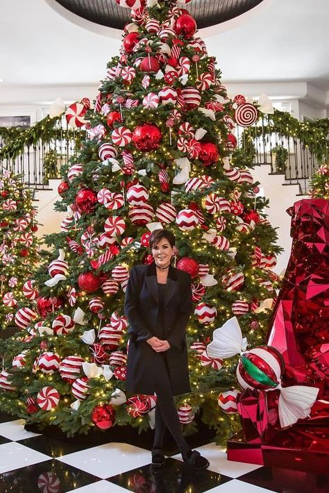 Kris Jenner Christmas Decor, Elegant Candy Cane Christmas Tree, Santa Clause Christmas Trees, Kris Jenner Christmas Tree, Candy Canes On Christmas Tree, Candy Cane Christmas Tree Theme, Christmas Candy Display, Kris Jenner Christmas, Red And White Christmas Tree Ideas