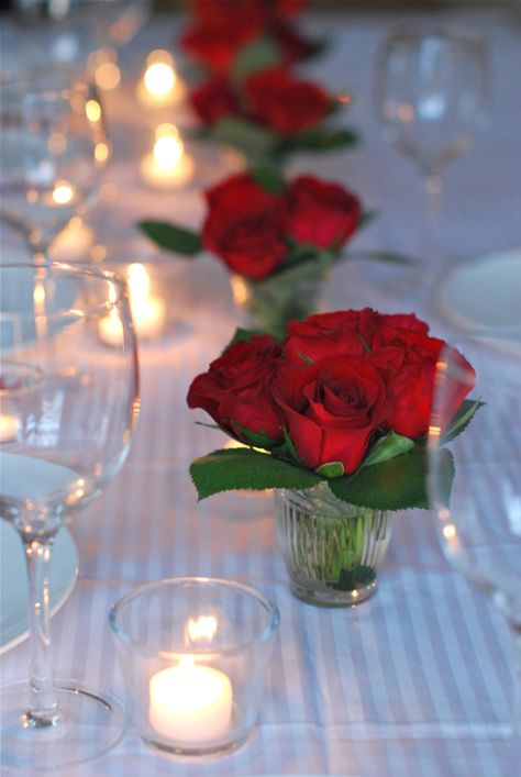 A few Small arrangements for the steps in sanctuary. Red and white roses (from Costco $17 for 2 dozen) greens, baby's breath? Dinner Table Bouquet, Small Red Roses Centerpieces, Small Red Rose Arrangement, Roses In Small Vases, Red Flower Table Centerpieces, Simple White Flower Centerpieces, Dinner Flower Arrangements, Roses Table Centerpieces, Rose Centerpieces Diy