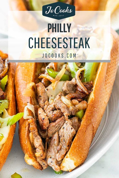 A classic Philly Cheesesteak sandwich made easy, in under 30 minutes! Hosting thinly sliced steak, and loads of ooey-gooey melted provolone. #phillycheesesteak #recipe