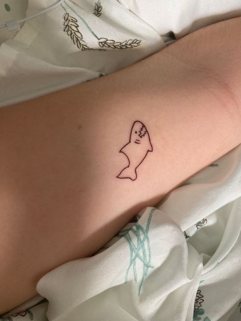 Shark Tiny Tattoo, Shark And Dinosaur Tattoo, Tiny Shark Tattoo Simple, Cute Shark Tattoo Small, Silly Shark Tattoo, Minimalistic Shark Tattoo, Simple Silly Tattoos, Funny Shark Tattoo, Shark Fine Line Tattoo