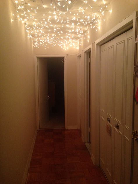 Hallway. Used icicle lights and command strips. Hallway Fairy Lights, Fairy Lights Hallway, Hallway Christmas Lights, Hallway Christmas, Uni House, Hallway Ceiling Lights, House Party Decorations, 18th Bday, House Essentials