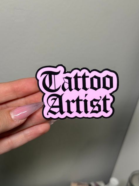 "TATTOO ARTIST" Pink sticker in gothic font :) 💕 🌿Availabile in the pink and the B&W styles that match my other tattoo bottle labels on my shop Perfect for accessorizing Your toolbox, favorite water bottle, notebook, your station and more!  -Sticker measures about 2x3inches.  -Listing is for one sticker -Lables are completely handmade and die cut from high quality printable vinyl that has been laminated with clear vinyl for extra protection and durability:) I also have matching tattoo bottle labels and other tattoo artists accessories available in separate listings also on my Etsy shop :) 💕 🔨How to apply:  Stickers are made from waterproof printable vinyl, simply peel backing off of sticker and apply to bottle! Be sure that your surface is completely clean and dry before applying stick Tattoo Shop Merch, Tattoo Artist Logo Design, Tattoo Bottle, Tattoo Artist Aesthetic, Label Tattoo, Artist Accessories, Tattoo Dream, Tattoo Studio Interior, Sticker Tattoo