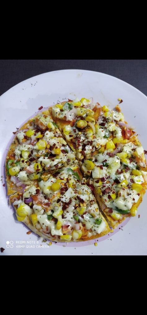 Try this Veg pizza, loaded with sweet corn, paneer and cheese. Sweet Corn Pizza, Corn Pizza, Veg Pizza, Kids Blouse Designs, Kids Blouse, Sweet Corn, Cheese Pizza, Paneer, Vegetable Pizza