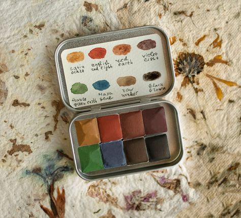 Handmade watercolor paint set, Mineral watercolor palette. Mini travel paint set. Earth Handmade palette, Natural Watercolor Paint Set, Mineral Watercolor, Eco-friendly Paint, Artist Gift Set, Watercolor Gift, Set. This palette is a collection of eight handcrafted eco-friendly watercolors from natural sources. It is a handmade watercolor set of eight individually wrapped half pans in a metal tin. Our watercolors are artist quality, have excellent lightfastness, and are non-toxic - cadmium, cobal Watercolor Paint Palette, 2023 Board, Natural Watercolor, Clove Essential Oil, Nature Watercolor, Earth Pigments, Watercolor Paint Set, Eco Friendly Paint, Travel Painting