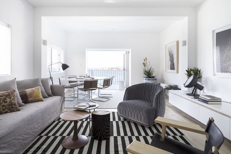 The oceanside setting was a primary influence on the interior colour palette and overall aesthetic of this Sydney apartment. Dulux White Paint, Dulux White, Monochromatic Room, Ikea Rug, Beautiful Apartments, Living Room Grey, Lounge Room, Colorful Interiors, Interior Inspiration