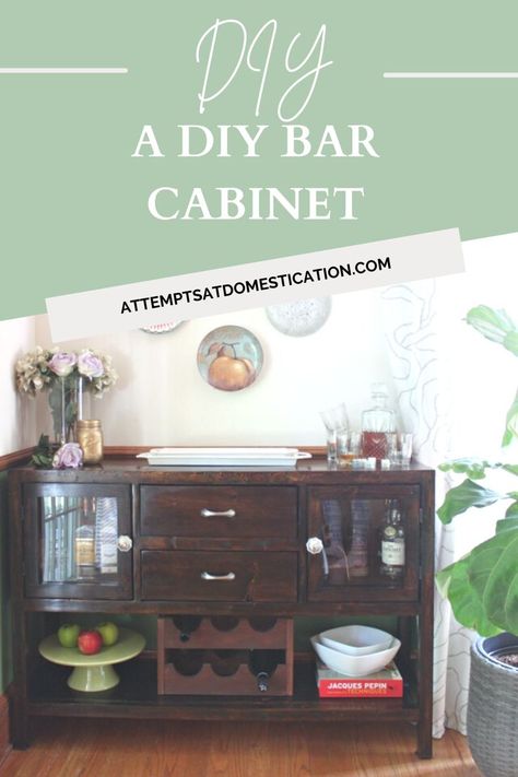 See how I styled our DIY bar cabinet and how it took months to find a style that I liked. Plus, get the link to the build plans to make your own! Diy Bar Cabinet, Build Plans, Glass Front Cabinets, Diy Bar, The Dining Room, Bar Cabinet, Bottom Shelf, A Drink, Changing Table