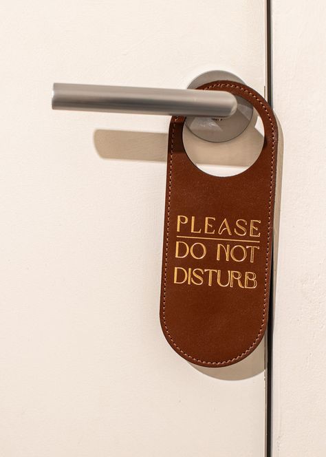 Refine your guests' privacy with our Do Not Disturb Door Sign. This custom door sign, perfect for hotels, features a stylish, minimalist design that complements any interior. The hotel room sign is made from two layers of thick Italian leather and is available in various colors to suit your aesthetic needs. Do Not Disturb Sign Aesthetic, Do Not Disturb Aesthetic, Hotel Door Hanger, Do Not Disturb Door Sign, Hotel Room Key, Recruitment Ads, Do Not Disturb Sign, Don't Disturb Sign, Hotel Door