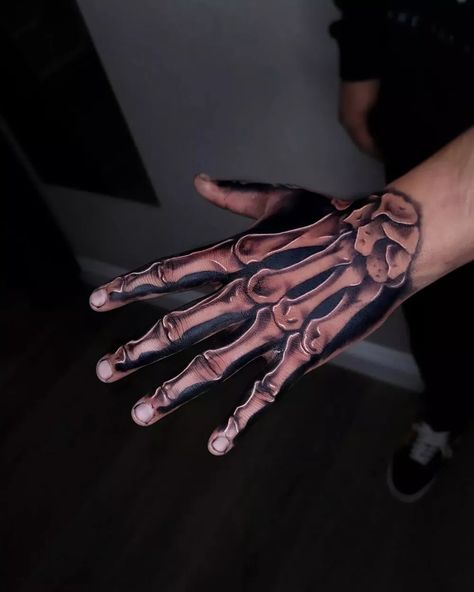 61 Skeleton Hand Tattoo Ideas With Deep Meanings Hand Tattoo Skeleton Bone, Skull Hand Tattoo Stencil, Spiderweb Neck Tattoo, Skeleton Fingers Tattoo, Skeleton Tattoo Hand Men, Bone On Hand Tattoo, Skeleton Hand Tattoo Stencil, Skeletal Hand Tattoo, Hand Bones Tattoo