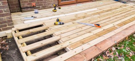 If you're wondering if plywood will work for your new deck, you've found the answer. Wooden Decking, Diy Patio Pavers, Wood Decking, Woodworking Tools For Beginners, Dream Deck, Wooden Deck, Cheap Patio, Budget Garden, Budget Patio