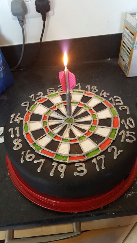 Dartboard cake with dart candle I made out of a dowel, cocktail stick, a candle, dart flights and icing. Dart Cake, Dart Board Cake, Dartboard Cake, Candles For Cake, Enchanted Party, Dart Flights, 35th Birthday, 50th Party, Cocktail Sticks