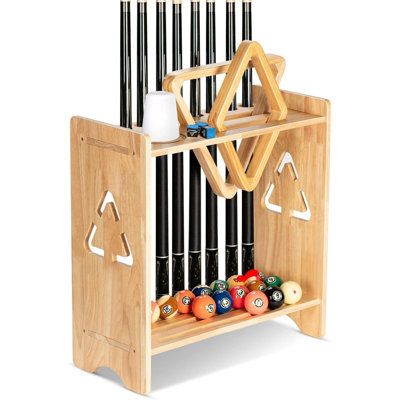 This pool cue rack can hold 9 cue sticks, a set of balls, and 2 spaces to put triangles or diamond billiard ball racks. There is a space dedicated to the cone chalk and extra space to hold chalk, a brush, or whatever else. Whether playing pool in your home game room, club, garage, man cave, or in a bar or restaurant setting you can organize your billiards cues and balls with this pool stick holder floor stand. If you do, that will definitely give your pool room a nicer and more professional feel Billiard Ball Racks, Pool Stick Holder, Pool Rack, Pool Cue Holder, Restaurant Setting, Pool Cue Rack, Pool Table Accessories, Playing Pool, Home Game Room