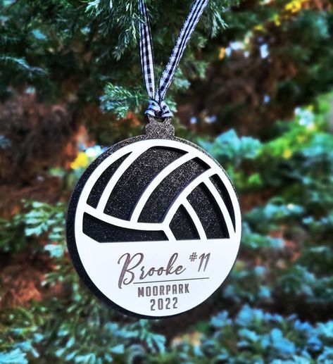 Commemorate your player's volleyball season with a personalized ornament. The background color can be customized to your team colors or left natural. Volleyball Crafts, Name Background, Volleyball Ornaments, Volleyball Coach, Laser Cut Wood Crafts, Black And White Ribbon, Volleyball Gifts, Coach Gift, Volley Ball