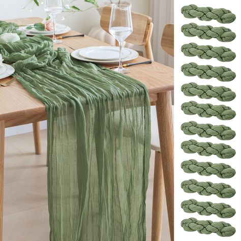 PRICES MAY VARY. 【Cheesecloth Table Runner】 Size: 35" W x 120" L. You will get 12 pieces 10FT length cheesecloth table runner. The sheer rustic table runner is long enough to span a large table and drape gracefully across the table. It will gently sway in the wind, adding a romantic atmosphere to your occasion. These eye-catching gauze table runners are ideal for arranging an elegant, stylish tablescape. 【Soft and Reusable】 The long table runner is made of high-quality wrinkled design gauze fabr Boho Tablecloth, Rustic Tablecloths, Vintage Wedding Table, Rustic Table Runners, Table Runner Size, Long Table Runner, Table Flag, Table Runners Wedding, Boho Green