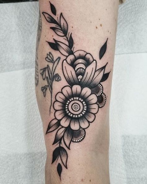 RAB - actually Barney on Instagram: "🏵🌿🖤" Old School Flower Tattoo Sleeve, Traditional Tattoos Flower Sleeve, Black Flower Tattoo Design, American Traditional Flowers Black, Old School Tattoo For Women, Elbow Flower Tattoos, Sammi Core, Traditional Style Tattoo For Women, Forearm Tattoos Women